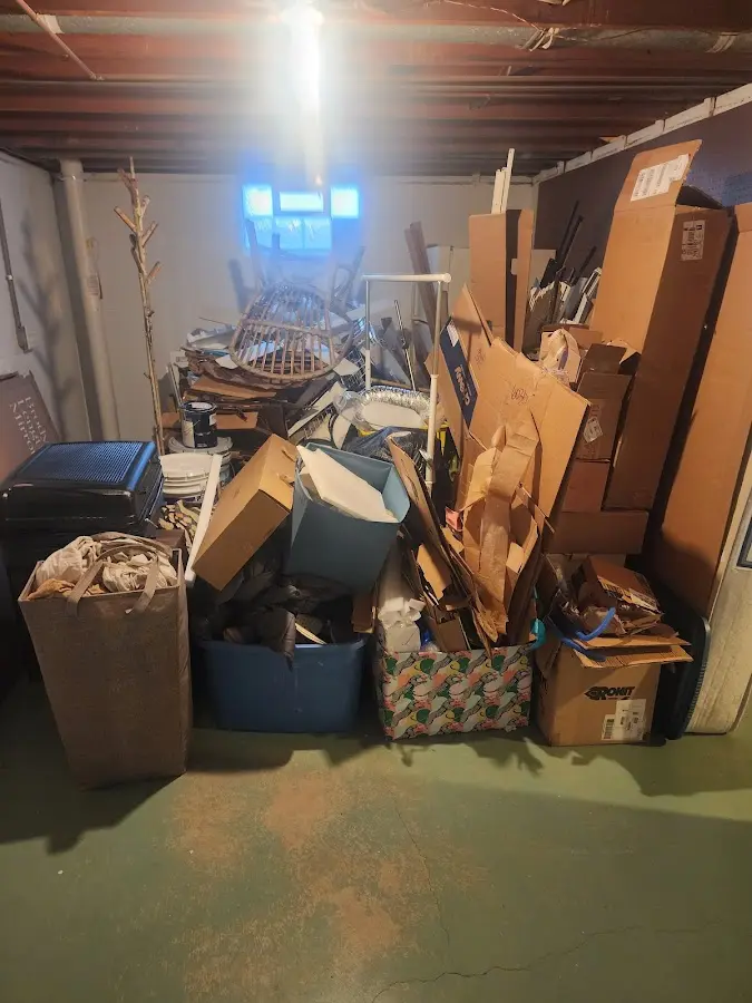 Roll-off dumpster container at job site for 2 Yard Dumpster Rental in Fallbrook